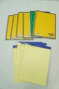group of notebooks and legal pads