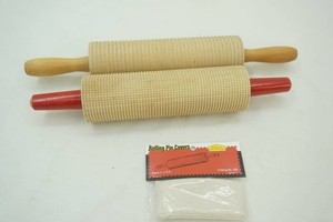 2 rolling pins and NIP rolling pin covers
