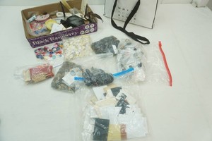 large assortment of vintage buttons and other sewing supplies