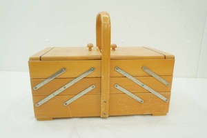 vintage sewing box filled with sewing supplies