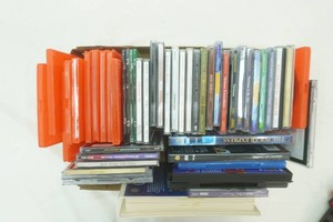 group of CDs, DVDs and 1 VHS