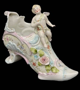 Antique Porcelain Shoe-Form Vase With Putto & Flowers