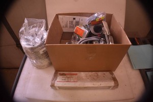 Box of miscellaneous plumbing items