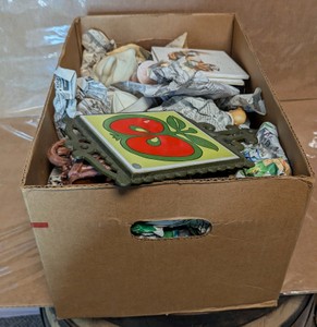 Box Lot of Assorted Decorative Trivets, Art Tiles, Juicer & Dishware
