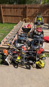 Lawn and Garden Equipment Assortment with Mowers Trimmers and Pressure Washer