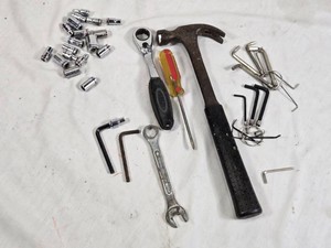 14  drive sockets, wrenches, hammer