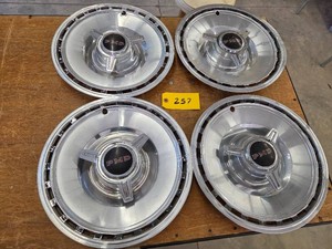 (4) Pontiac Hubcaps with (2) New Ce...