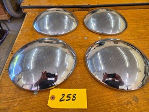 (4) Baby Moon Hubcaps...