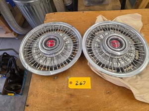 (2) Pontiac Hubcaps...