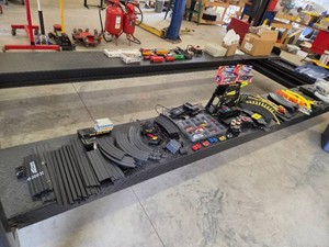 Assorted Slot Cars with Tracks & Ac...