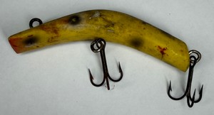 Vintage Lazy Ike-Style Yellow Banana-Shaped Fishing Lure with Treble Hooks