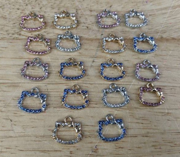 18 Hello Kitty-Inspired Charms - Brand New