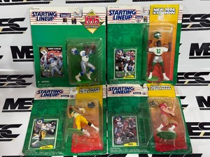 (4) Football Starting Lineup Figures - Barry Sanders, Rod Woodson, Randalll Cunningham, Bert Jones