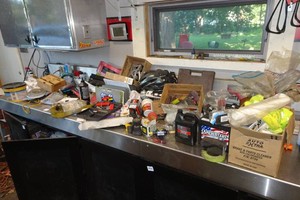 Contents of Countertop - Battery, Headlight, Oil