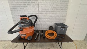 Rigid Shop Vac with a Box of Accessories