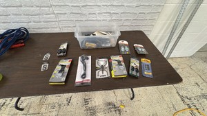 Box of various Tiedowns and attachment tools. lots of NiteIze branded products