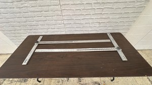 pair of 48 inch Johnson Original Adjust-a-squares 48 inch with angle adjustment