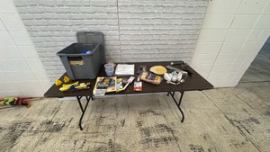 Tote With Drywall and Painting Supplies