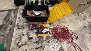 Tote with misc tools, long extension cord, new tire inflator, HDTV antennae & much more