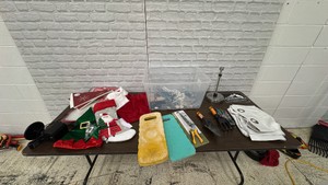 Tote of Christmas decorations, Tea Light Candles, Household items, and Gardening supplies