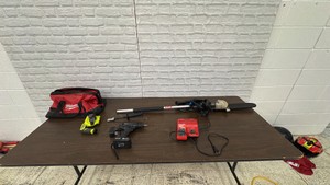 Milwaukee charger, tote, and pole saw attachment with assorted tools