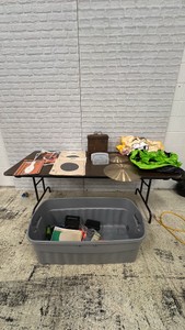 Rubbermaid Heavy Duty Tot with shooting targets, goggles, ammo box, cymbals, and 2 inflatable water toys