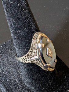 Ornate Filigree Statement Ring With Dark Oval Centerpiece Size 6