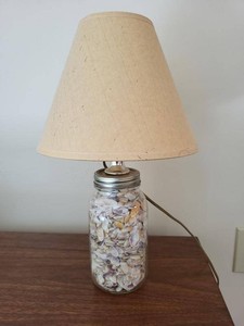 Coastal Seashell Filled Glass Jar Table Lamp With Beige Fabric Shade