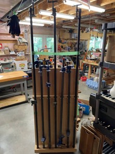 Set of 7 Long Pipe Clamps With Wood Storage Rack Approx. 6 Ft Tall
