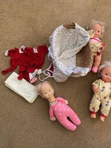 Group of Vintage Baby Dolls Wicker Bassinet & Doll Clothes Lot