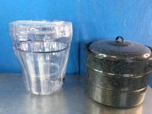 Black speckled enamelware water bath canner pot with a matching lid