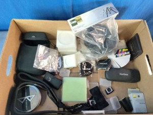 Mixed lot of photography gear, camera accessories, and Sun Glasses