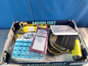 Box containing an assortment of loose items