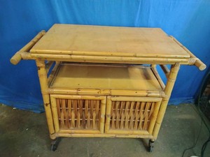 Vintage mid-century rattan and bamboo rolling serving or bar cart