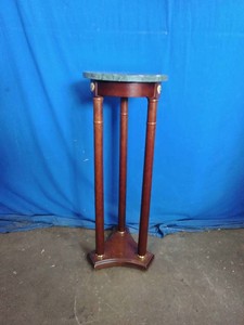 Round accent table or plant stand with a green marble top
