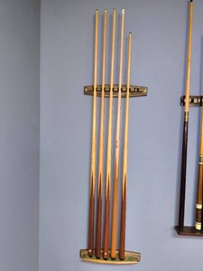 Pool cues and pool table accessories