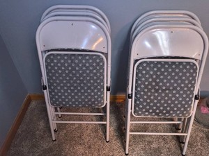 6 white metal folding chairs-grey patterned seats