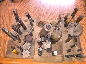 Collection of assorted metal milling bits and drill bits