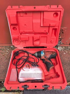 Milwaukee Brand Cordless Drill - Case and Battery Charging Station