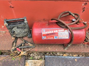 Portable air tank and jumper cables