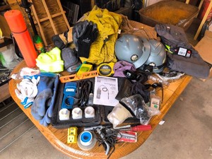 Workmans Duffle Bag of Goodies -Carhartt Overalls, New hatglovesGlasses, Hard Hats, Knee Pads, Portable Temperature Instrument