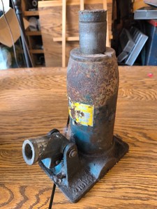 Vintage Blue Hydraulic Bottle Jack with Side Mounted Pump Handle Socket.