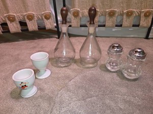 Egg cups, oil and vinegar bottles and salt and pepper shakers, six piece lot