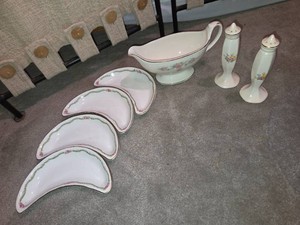 Gravy boat, S&P, 4 crescent shaped small plates.