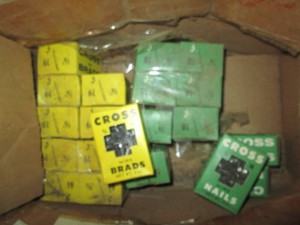 Large supply of assorted size cross nails
