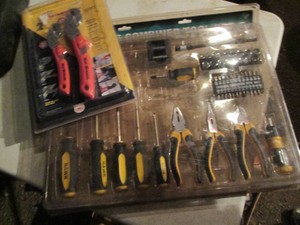 Large pliers, screwdriver, socket and bit set plus nut wrench set