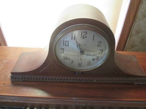 Sessions camelback style wood Encased mantle