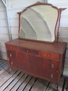 Vintage dark wood ladies dresser with wood framed carved detail swivel mirror (without mirror unit is approx 50x21x34in