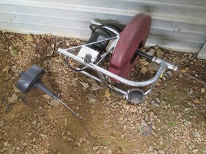 Hand operated and drill powered drain augers