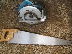 Makita circular saw and vintage hand saw